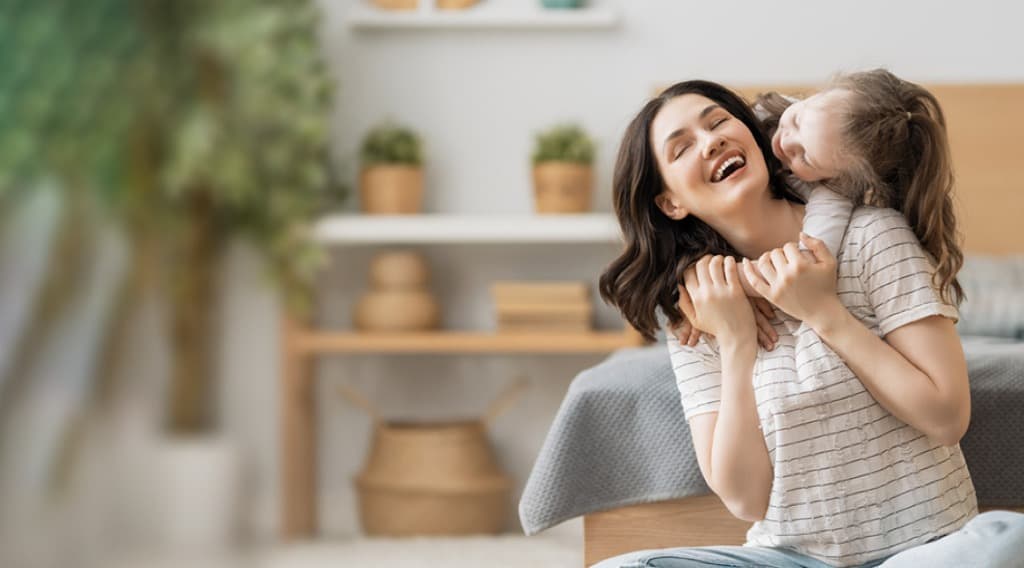 Happy mother and daughter